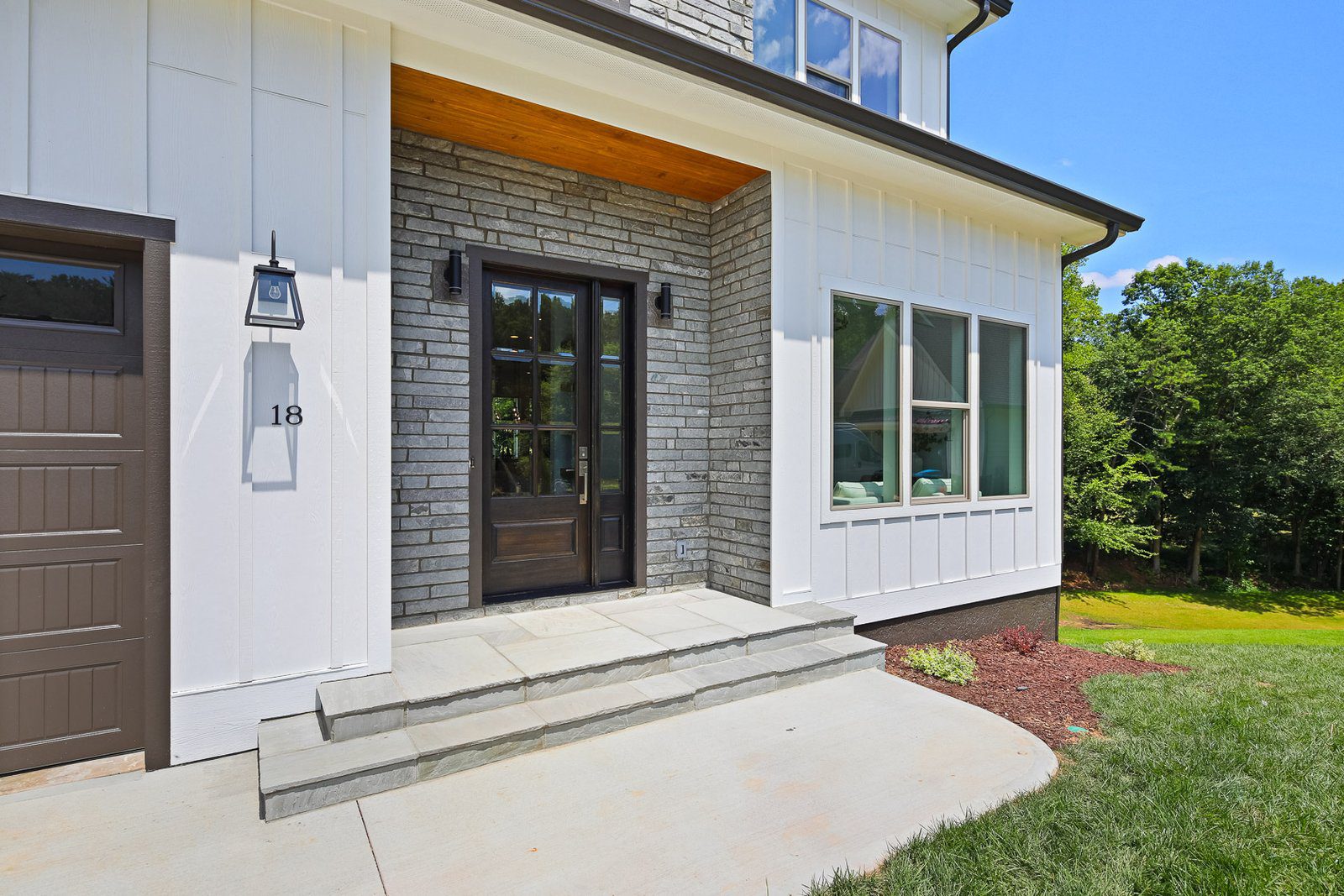 Blending Centuries-Old Materials with Contemporary Design: A Timeless Fusion. Big Hills Construction Custom Home Builder in Asheville, North Carolina